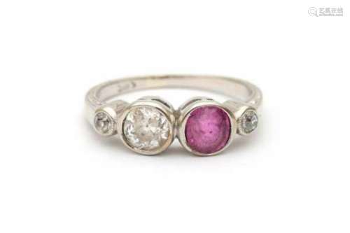 Edwardian 14 carat white gold ruby and diamond ring, set with a ruby and a old cut diamond in the