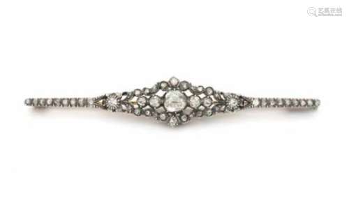 14 carat gold bar brooch with rose cut diamonds, center rose cut Diamond measures 5 mm diameter.