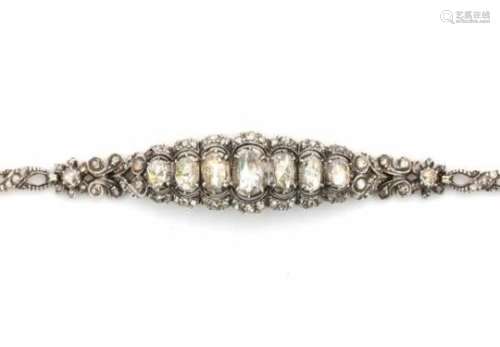 14 carat gold and silver rose cut diamond bracelet, set with seven oval cut graduating rose cut