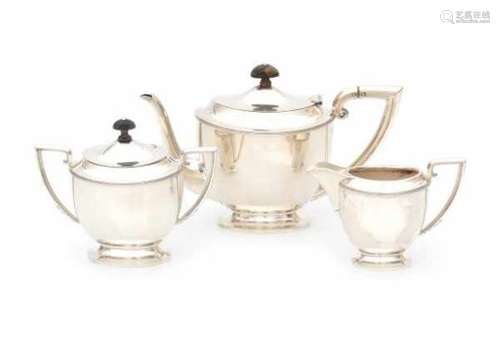 A Dutch silver three-piece tea service. Maker's mark C.L.J. Begeer, Utrecht. Year letter 1919.