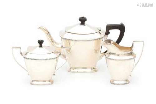 A Dutch three-piece silver tea service. Maker's mark C.L.J. Begeer, Utrecht. Year letters 1914 and