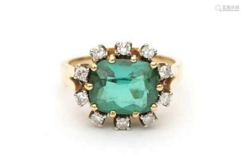 14 carat gold tourmaline and diamond cluster ring, set with a cushion cut tourmaline of ca. 2.75 ct.