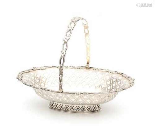 An oval English silver basket. Maker's mark W. Hutton & Sons Ltd. Hallmarked Sheffield. Year