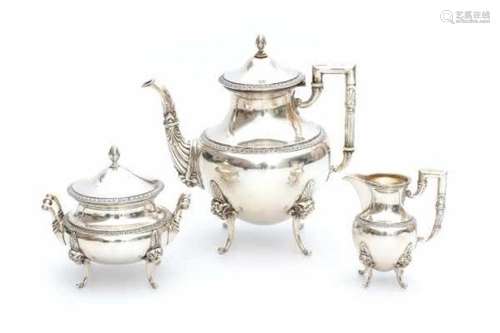 A German three-piece silver tea service. Maker's mark Bruckmann & Söhne, Heilbronn.Weight: 1440