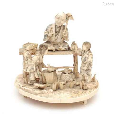 A Japanese ivory okimono, market seller sitting on a bench with a pipe and a hoe with two figures in