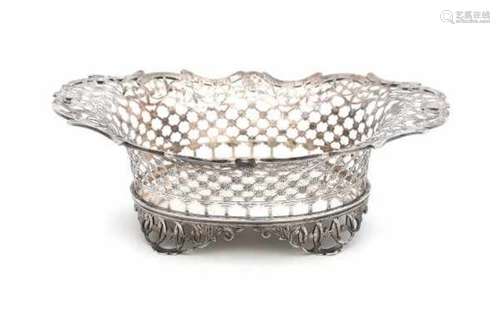 A Dutch silver basket. Ca. 1900. Marked for Friesland and with pseudo antique hallmarks.Length 21