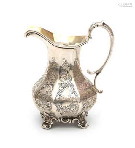 An English silver milkjug. Maker's mark Robert, James and Josiah Williams. Hallmarked Exeter. Year