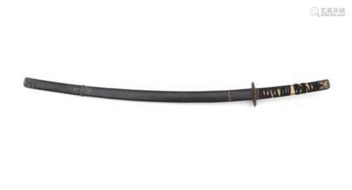 A Japanese sword 'katana'. The grip with tsuba and kashira. The sheath in black lacquer. Signed,