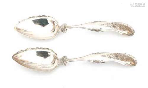 A pair of Dutch silver serving spoons. Maker's mark Wed. Gerardus Wilheminus Uriot, Amsterdam.