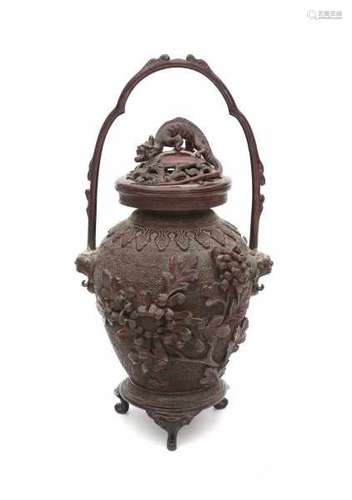 A Japanese bronze koro, with modelled chrysanthemums and a chilong. Meiji period (1868-1912).