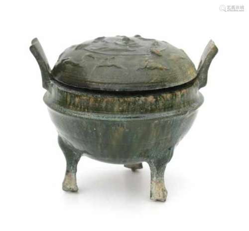 A Chinese green monochrome glazed incense burner 'ding'. With associated cover. Han style.Diameter