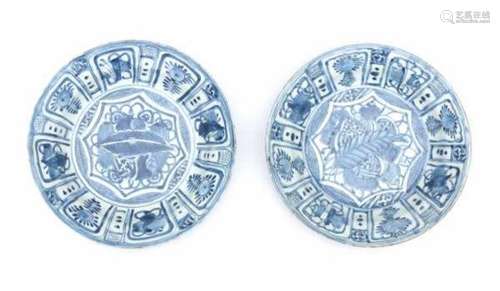 A pair of Chinese blue and white chargers, decorated with buddhist symbols. Wanli period (1573-