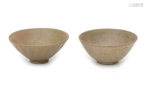 Two light brown glazed bowls, one modelled with lotus petals, the other with an incised floral