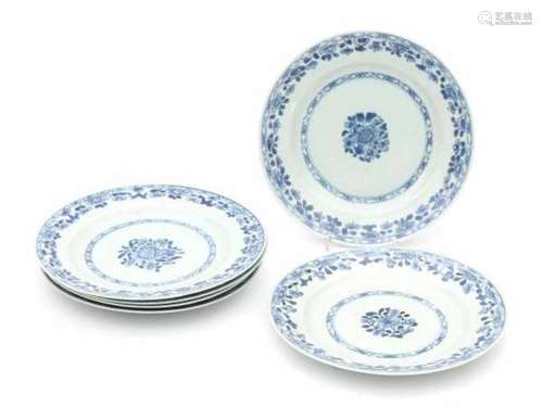 A set of six Chinese blue and white plates, with incised pattern and decorated with flowers. 19th