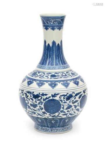 A Chinese blue and white Ming style lotus vase. Marked with an apocryhal six character Guangxu mark,