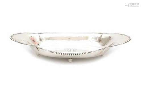 A Sterling silver tray. Tiffany & Co. With an engraved monogram.Length 35,5 cm. Weight: 451