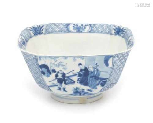 A Chinese blue and white square section bowl, decorated with four scenes from 'The Romance of the