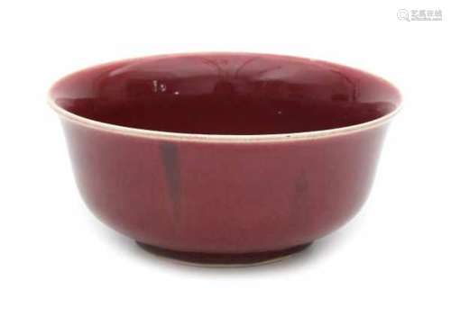 A Chinese monochrome copper red 'lang yao hong' bowl. 20th century.Diameter 23 cm.- - -29.00 %