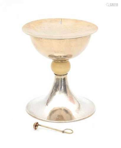 A Dutch silver chalice with paten and spoon. Partly gilded. The stem with ivory ball. Maker's mark