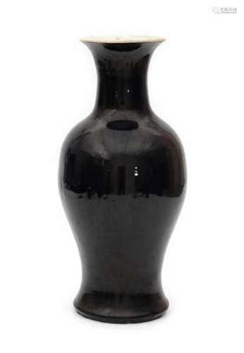 A Chinese monochromed mirror black vase. 18th century.height 42 cm.- - -29.00 % buyer's premium on