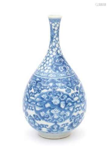 A Chinese blue and white bottle vase, decorated with floral pattern in four linked cartouches.