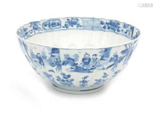 A Chinese blue and white moulded lotus bowl, decorated with a rim of scenes with various figures