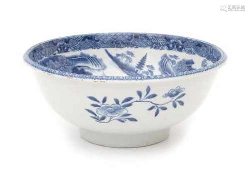 A Chinese blue and white export bowl, decorated with pagodas in a riverscape. 18th centuryDiameter