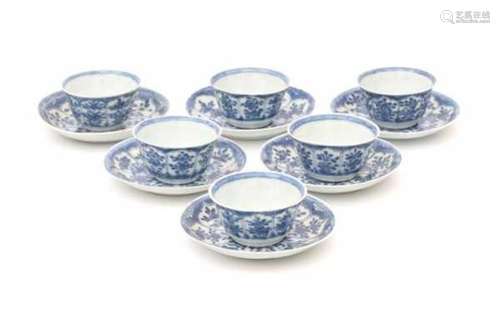 A set of six Chinese blue and white cup and saucers, decorated with flowers in petal shaped