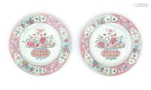 A pair of Chinese famille rose plates, decorated with a flower basket. Yongzheng period (1723-