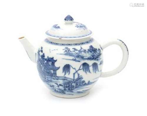 A Chinese blue and white teapot, decorated with pagodas in a riverscape. 19th centuryheight 15