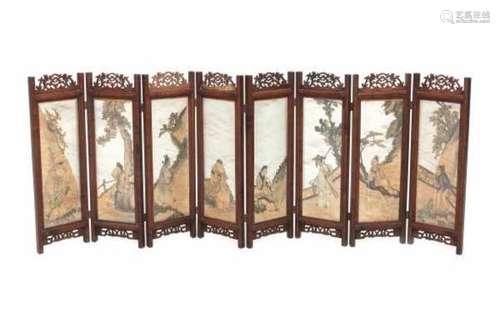 A Chinese eight panel folding tablescreen, decorated with immortals. Circa 192055,5 x 148 cm.- - -