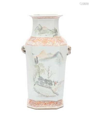 A Chinese octagonal famille rose vase, one side decorated with a mountainous landscape, the other