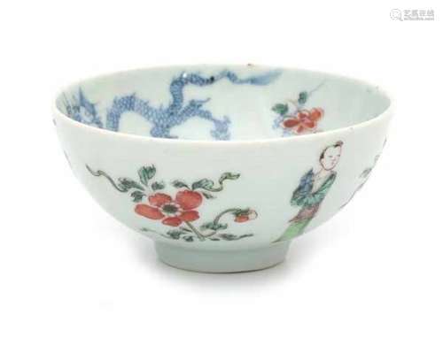 A Chinese famille rose bowl, the outside decorated with elegant ladies and flowers, the inside