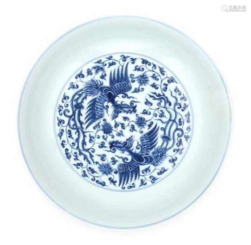 A Chinese blue and white charger, decorated with two phoenix. With apocryphal six character Chenghua