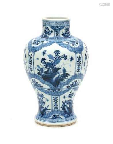 A Chinese blue and white vase, decorated with panels of flowers and butterflies. With apocryphal