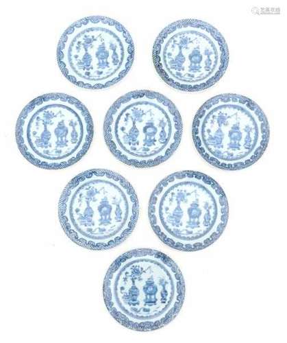 A set of eight Chinese blue and white plates, decorated with precious objects. Qianlong period (