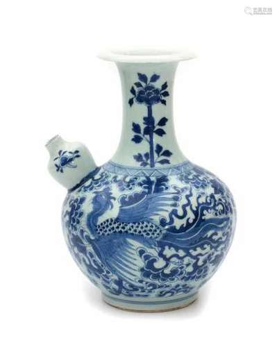 A Chinese blue and white ghendi, decorated with two phoenix. 19th century.height 27 cm.- - -29.