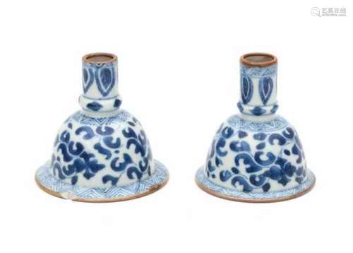 Two Chinese blue and white wine funnels, decorated withy a floral pattern. 18th centuryDiameter 7