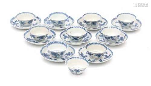 A set of nine Chinese blue and white cup and saucers, decorated with peaches. Kangxi period (1662-