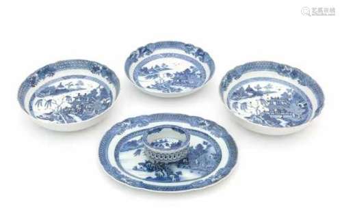 A collection of five Chinese blue and white export pieces; two pierced fruit bowls, a salt cellar, a