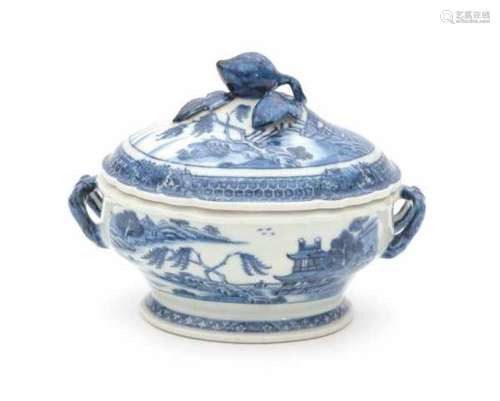 A small Chinese blue and white export terrine, decorated with pagodas in a river landscape. 18th