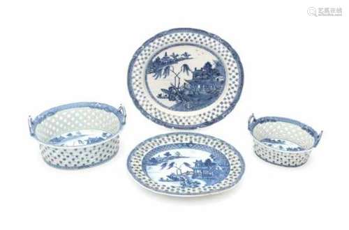 Two Chinese blue and white export pierced baskets and dishes, all decorated with pagodas in a