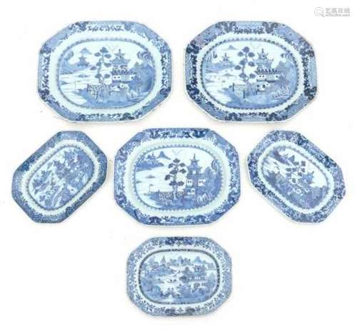 A set of five Chinese blue and white export serving dishes, decorated with pagodas in a river