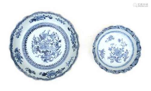 Two Chinese blue and white export serving bowls, decorated with flowers. 18th centuryDiameter 26 and