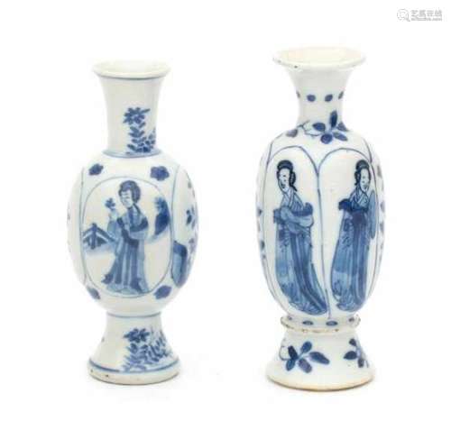 Two Chinese blue and white 'Long Eliza' vazes, decorated in panels. 19th centuryheight 12 and 13