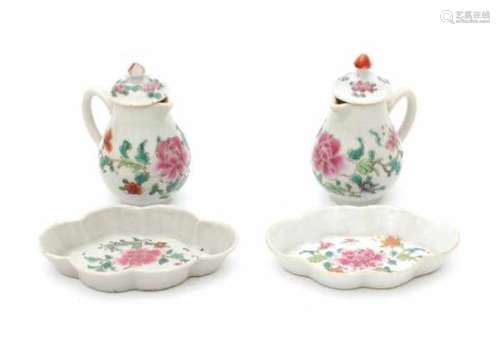 A pair of Chinese famille rose cream jugs and two pattipan, all decorated with peonies. 18th