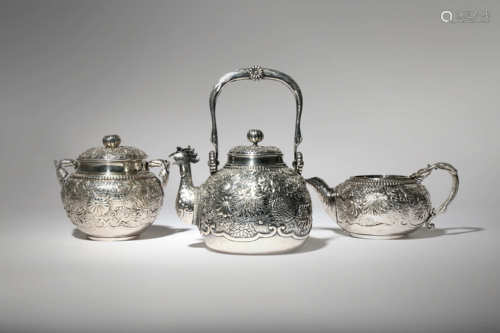 A JAPANESE THREE-PIECE SILVER TEA SET