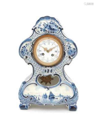 A Dutch Delftware Porceleyne Fles clock. Dated 1907. Monogram for Petrus Johannes Gerbrands (