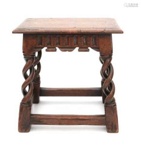 An oak English 'stool'. 18th centuryDimensions 47 x 25,5 x 28 cm.- - -29.00 % buyer's premium on the