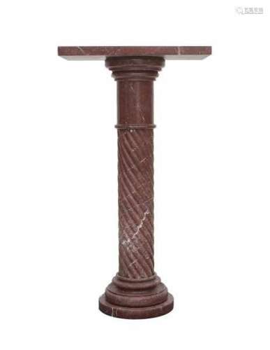 A red marble pedestal. 19th centuryheight 110 cm. Top 60 x 35 cm.- - -29.00 % buyer's premium on the